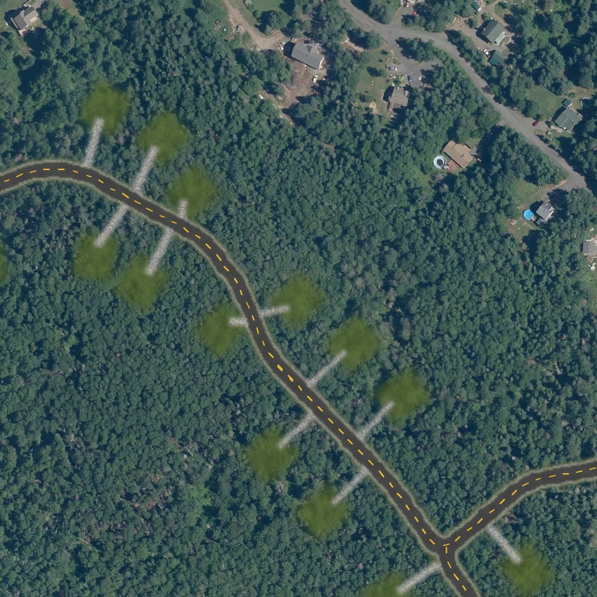 Photo aérienne du terrain 10 et de ses environs, avec la limite du terrain tracée en doré