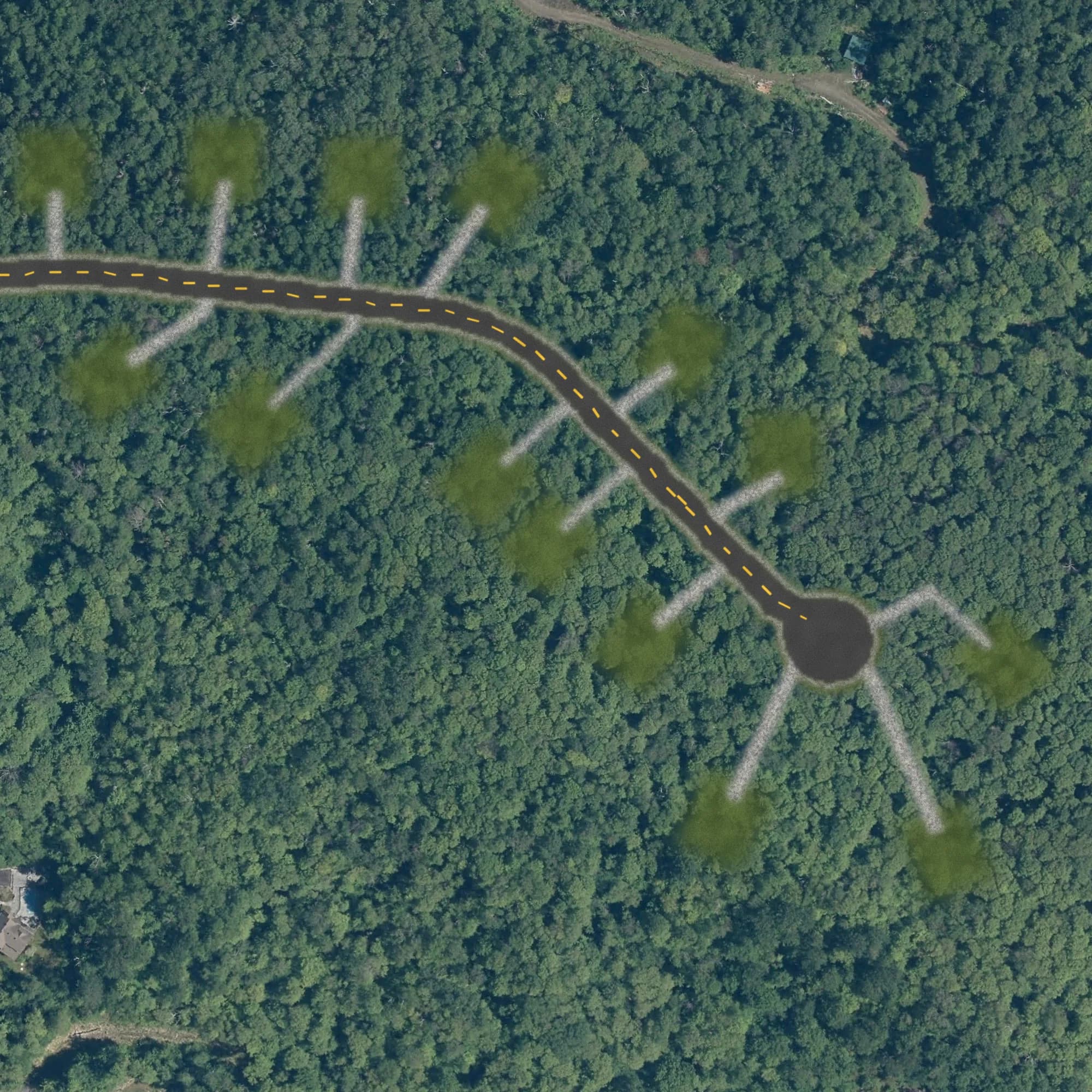 Photo aérienne du terrain 32 et de ses environs, avec la limite du terrain tracée en doré