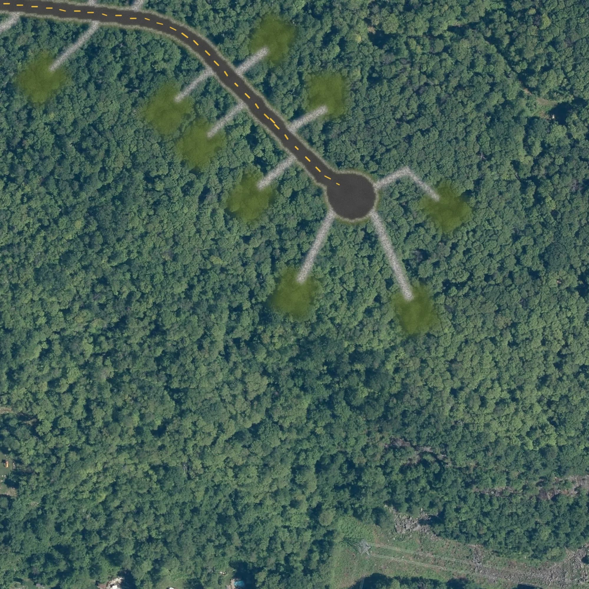 Photo aérienne du terrain 35 et de ses environs, avec la limite du terrain tracée en doré