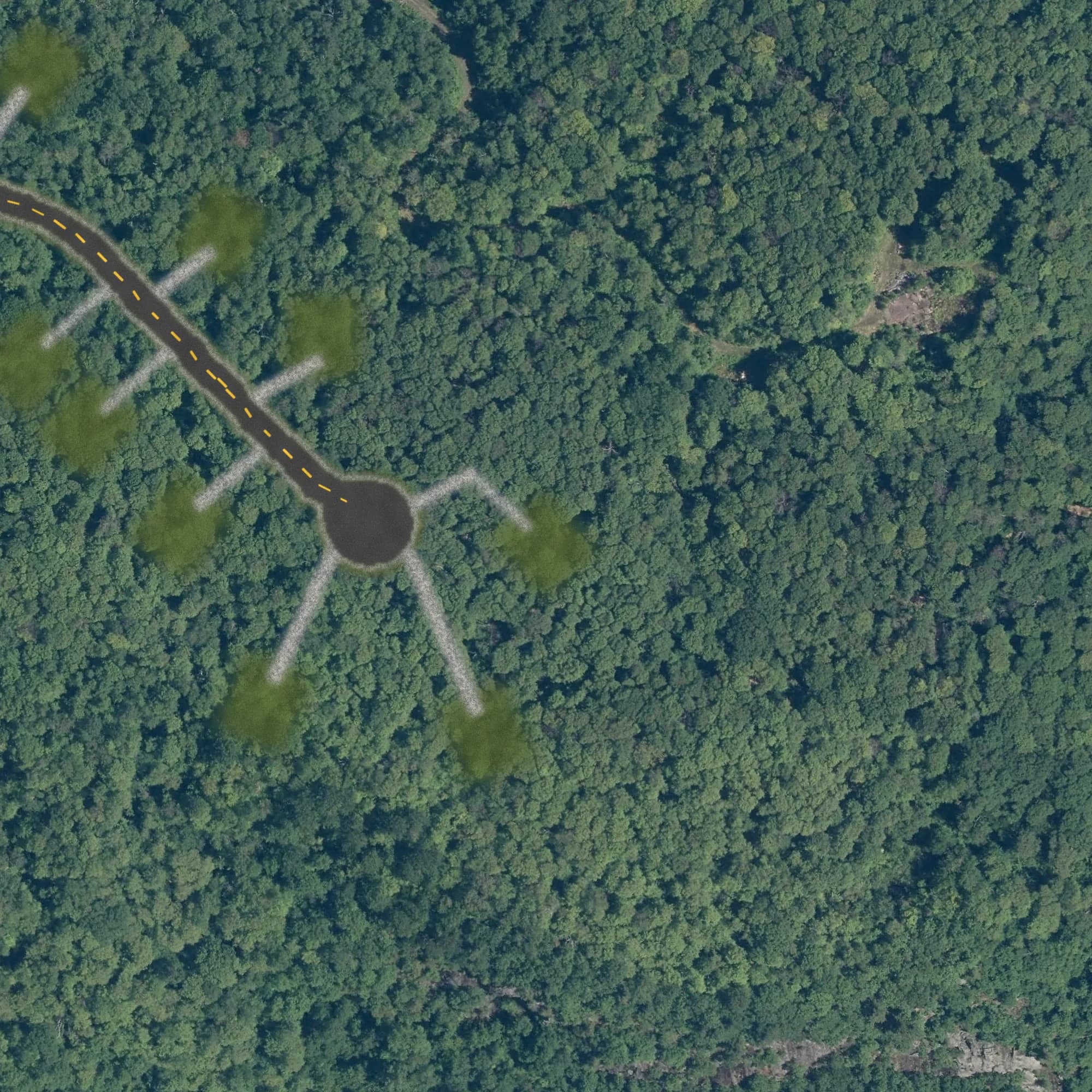 Photo aérienne du terrain 37 et de ses environs, avec la limite du terrain tracée en doré
